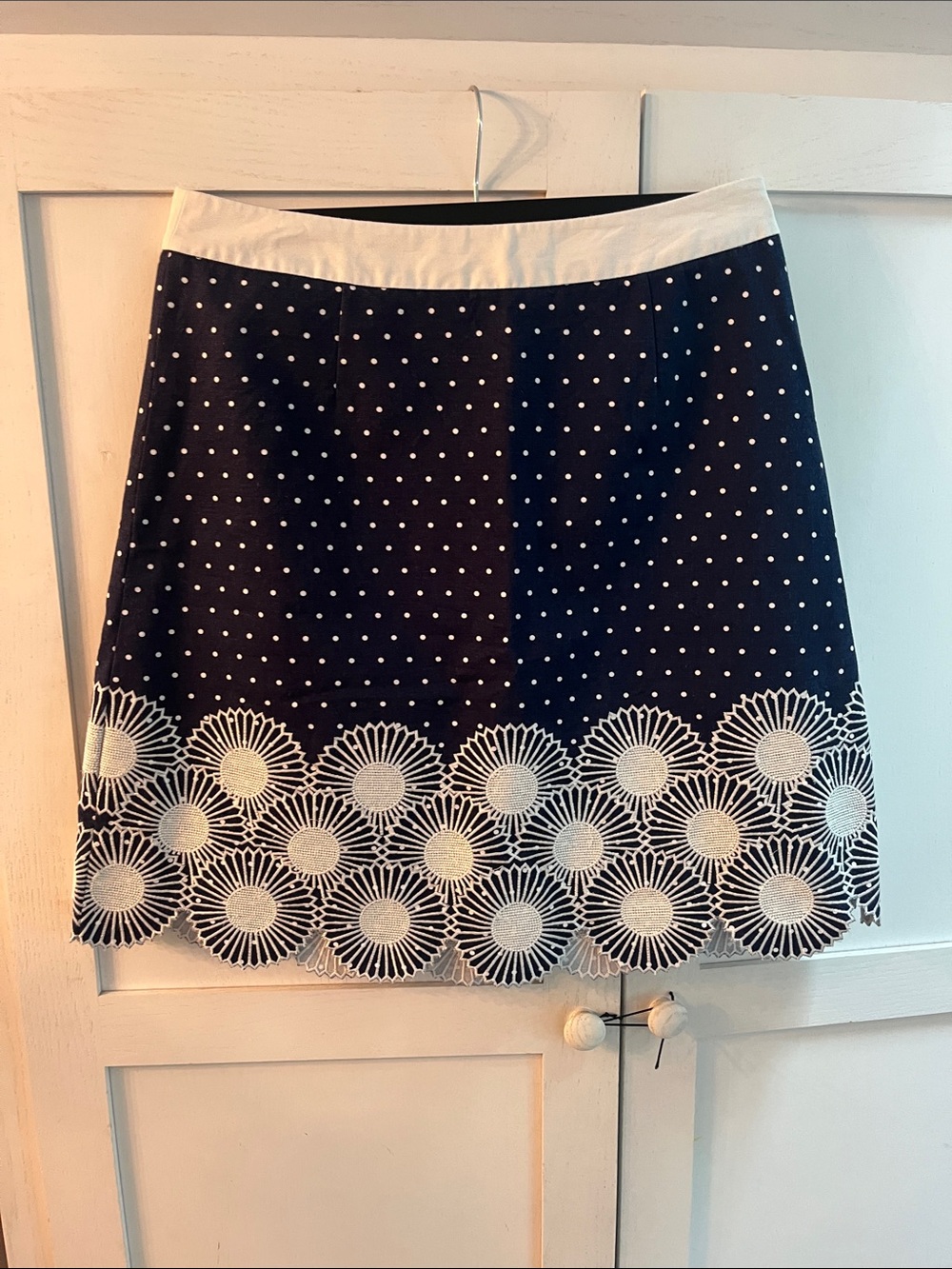 Boden Navy and White Polka Dot A-Line Skirt with Eyelet Floral Hem